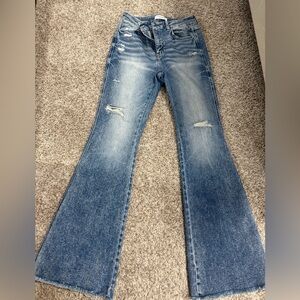 Women’s Flying Monkey Distressed Blue Flare Jeans.  Size 28 x34.  Barley worn.